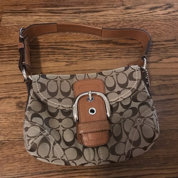 Coach Handbags - Coach purse with buckle detail Coach Handbags - Coach purse with buckle detail